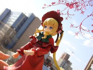 Rating: Safe Score: 0 Tags: 1girl blonde_hair blue_eyes blue_sky blurry bonnet bow building day doll dress drill_hair flower long_hair long_sleeves outdoors red_dress shinku sky solo twintails User: admin