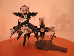 Rating: Safe Score: 0 Tags: 1girl boots doll dress full_body fur_trim long_sleeves solo standing suigintou wide_sleeves wings User: admin