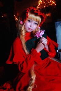 Rating: Safe Score: 0 Tags: 1girl bangs blonde_hair blue_eyes bonnet dress drill_hair flower lips long_hair looking_at_viewer red_dress rose shinku smile solo User: admin