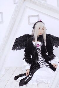 Rating: Safe Score: 0 Tags: 2girls black_dress black_wings dress feathered_wings feathers frills gothic_lolita hairband long_hair long_sleeves multiple_girls sitting solo suigintou wings User: admin