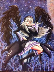 Rating: Safe Score: 0 Tags: 1girl black_wings dress frills image long_hair long_sleeves looking_at_viewer sitting solo suigintou wings User: admin