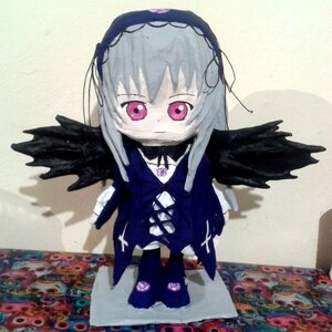 Rating: Safe Score: 0 Tags: 1girl black_wings chibi doll dress feathered_wings flower frills hairband long_hair long_sleeves looking_at_viewer pink_eyes rose silver_hair solo suigintou wings User: admin