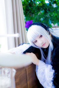 Rating: Safe Score: 0 Tags: 1girl bangs blurry blurry_background blurry_foreground closed_mouth curtains depth_of_field flower frills hairband lips long_hair long_sleeves looking_at_viewer solo suigintou upper_body white_hair User: admin