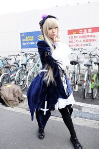 Rating: Safe Score: 0 Tags: 1girl black_footwear black_legwear blonde_hair dress long_hair long_sleeves looking_at_viewer photo solo standing suigintou User: admin