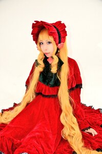 Rating: Safe Score: 0 Tags: 1girl blonde_hair blue_eyes bonnet dress flower frills long_hair long_sleeves red_dress rose shinku sitting solo very_long_hair User: admin