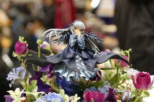 Rating: Safe Score: 0 Tags: 1girl black_dress blurry blurry_background depth_of_field doll dress flower frills hairband long_hair long_sleeves red_eyes silver_hair solo suigintou very_long_hair wings User: admin