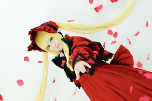 Rating: Safe Score: 0 Tags: 1girl blonde_hair blue_eyes bonnet bow dress flower long_hair long_sleeves looking_at_viewer petals red_dress shinku solo User: admin