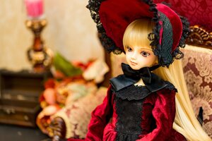 Rating: Safe Score: 0 Tags: 1girl blonde_hair blurry blurry_background blurry_foreground bonnet depth_of_field doll dress food frills long_hair long_sleeves photo shinku solo umbrella User: admin