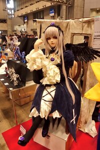 Rating: Safe Score: 0 Tags: 1girl black_wings boots dress hairband indoors long_hair red_eyes sitting solo standing suigintou wings User: admin