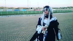 Rating: Safe Score: 0 Tags: 1girl building chain-link_fence city closed_eyes dress fence ferris_wheel holding long_hair outdoors rooftop sky skyscraper solo standing suigintou User: admin