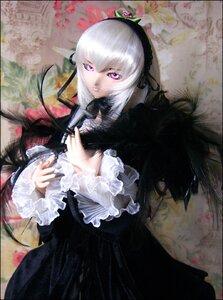 Rating: Safe Score: 0 Tags: 1girl doll dress frilled_sleeves frills hairband letterboxed long_hair long_sleeves looking_at_viewer pink_eyes silver_hair solo suigintou wings User: admin