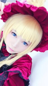 Rating: Safe Score: 0 Tags: 1girl bangs blonde_hair blue_eyes bonnet bow closed_mouth frills long_hair looking_at_viewer portrait shinku solo User: admin