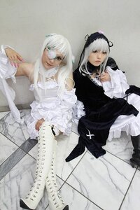 Rating: Safe Score: 0 Tags: 2girls black_dress detached_sleeves dress eyepatch frills gothic_lolita hairband lips lolita_fashion long_hair multiple_cosplay multiple_girls nail_polish photo sitting suigintou tagme white_hair User: admin