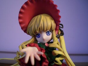 Rating: Safe Score: 0 Tags: 1girl bangs blonde_hair blue_eyes bonnet bow bowtie doll dress green_bow hat long_hair long_sleeves looking_at_viewer photo red_dress shinku simple_background solo twintails upper_body User: admin