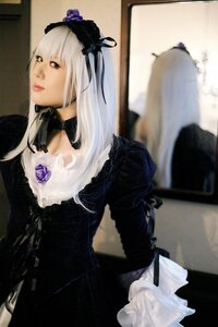 Rating: Safe Score: 0 Tags: 1girl black_dress blurry depth_of_field dress flower frills gothic_lolita lips long_hair long_sleeves photo solo suigintou User: admin