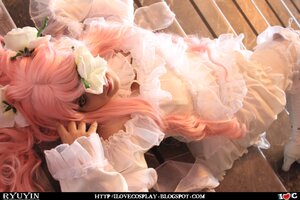 Rating: Safe Score: 0 Tags: 1girl dress flower frills kirakishou long_hair lying pink_hair rose solo User: admin