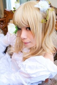 Rating: Safe Score: 0 Tags: 1girl bangs blonde_hair blurry blurry_background blurry_foreground closed_mouth depth_of_field flower hair_flower hair_ornament kirakishou lips long_hair looking_at_viewer photo solo User: admin