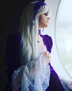 Rating: Safe Score: 0 Tags: 1girl closed_mouth dress frills lace long_hair long_sleeves profile purple_dress solo suigintou User: admin