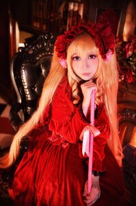 Rating: Safe Score: 0 Tags: 1girl blonde_hair blue_eyes dress flower frills gothic_lolita hair_flower holding lips lolita_fashion long_hair looking_at_viewer red_dress rose shinku solo very_long_hair User: admin