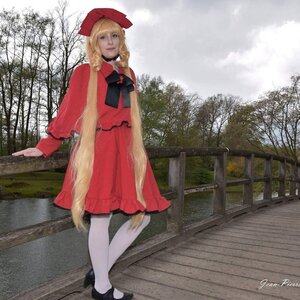 Rating: Safe Score: 0 Tags: 1girl blonde_hair blue_eyes braid dress hat lips long_hair realistic red_dress shinku shoes signature solo standing tree twin_braids User: admin