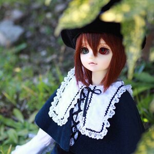 Rating: Safe Score: 0 Tags: 1girl black_headwear blurry blurry_background blurry_foreground brown_hair depth_of_field doll dress frills hat heterochromia long_sleeves looking_at_viewer outdoors red_eyes short_hair solo souseiseki suiseiseki upper_body User: admin