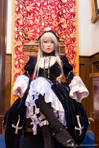 Rating: Safe Score: 0 Tags: 1girl black_dress dress frills gothic_lolita lips lolita_fashion long_sleeves sitting solo suigintou User: admin