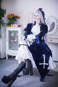 Rating: Safe Score: 0 Tags: 1girl black_footwear boots closed_eyes dress flower frills hairband high_heel_boots high_heels long_sleeves photo profile solo standing suigintou User: admin