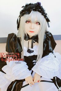 Rating: Safe Score: 0 Tags: 1girl black_dress black_ribbon closed_mouth dress gothic_lolita lips long_hair long_sleeves looking_at_viewer photo red_eyes ribbon solo suigintou User: admin