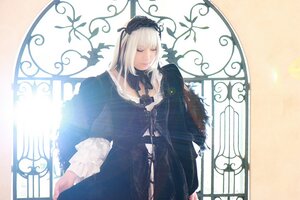 Rating: Safe Score: 0 Tags: 1girl bangs black_dress closed_eyes dress flower long_sleeves silver_hair solo standing suigintou white_hair wings User: admin