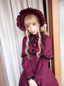 Rating: Safe Score: 0 Tags: 1girl bangs blonde_hair blue_eyes bonnet closed_mouth curtains dress expressionless flower lips long_hair long_sleeves looking_at_viewer red_dress rose shinku solo User: admin