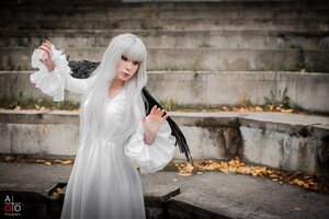 Rating: Safe Score: 0 Tags: 1girl artist_name bangs bird blurry blurry_background dress feathers long_hair long_sleeves outdoors red_eyes solo standing suigintou white_dress white_hair wings User: admin