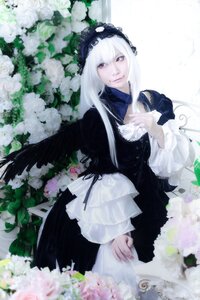 Rating: Safe Score: 0 Tags: 1girl black_dress black_wings blurry dress flower frills gothic_lolita hairband lolita_fashion long_hair long_sleeves looking_at_viewer red_eyes solo suigintou white_flower white_hair wings User: admin