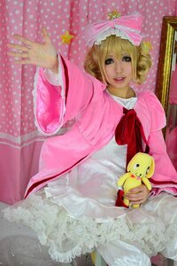 Rating: Safe Score: 0 Tags: 1girl blonde_hair dress frills hat hinaichigo pink_dress polka_dot solo stuffed_animal User: admin