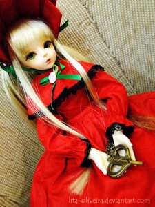 Rating: Safe Score: 0 Tags: 1girl blonde_hair bonnet bow bowtie capelet chain-link_fence doll dress fence green_eyes long_hair long_sleeves looking_at_viewer red_dress shinku sitting solo text_focus twintails User: admin
