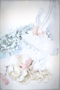 Rating: Safe Score: 0 Tags: 1girl bangs blonde_hair dress feathers flower frills hair_ornament kirakishou lace lips long_hair looking_at_viewer lying solo white_dress white_theme User: admin