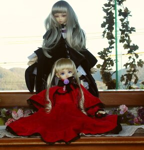 Rating: Safe Score: 0 Tags: 2girls bangs blonde_hair blue_eyes blunt_bangs doll dress flower long_hair multiple_dolls multiple_girls red_dress rose shinku sitting tagme User: admin