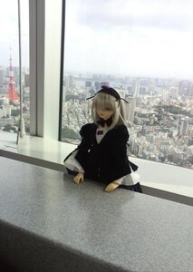 Rating: Safe Score: 0 Tags: 1girl building city cityscape closed_mouth doll dress long_hair long_sleeves sitting skyscraper solo suigintou User: admin
