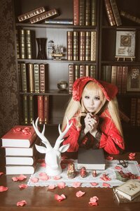 Rating: Safe Score: 0 Tags: 1girl blonde_hair bonnet book book_stack bookshelf cup doll dress flower indoors library long_hair petals shinku solo traditional_media User: admin