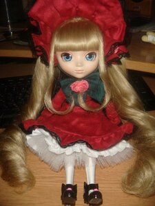 Rating: Safe Score: 0 Tags: 1girl bangs blonde_hair blue_eyes bonnet bow doll dress flower frills long_hair long_sleeves looking_at_viewer red_dress rose shinku shoes solo standing white_legwear User: admin