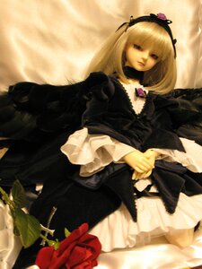 Rating: Safe Score: 0 Tags: 1girl blonde_hair detached_collar doll dress flower frills hairband long_hair long_sleeves red_flower red_rose ribbon rose solo suigintou User: admin