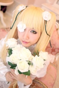 Rating: Safe Score: 0 Tags: 1girl bangs blonde_hair blurry blurry_background blurry_foreground bouquet depth_of_field flower hair_flower hair_ornament kirakishou lips long_hair looking_at_viewer photo ribbon rose smile solo white_flower white_rose User: admin