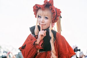 Rating: Safe Score: 0 Tags: 1girl blonde_hair blue_eyes closed_mouth finger_to_mouth index_finger_raised lips long_hair long_sleeves looking_at_viewer photo red_dress shinku shushing smile solo User: admin