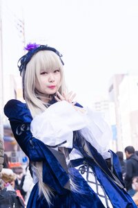 Rating: Safe Score: 0 Tags: 1girl bangs blurry blurry_background depth_of_field dress flower hairband lips long_hair long_sleeves looking_at_viewer solo solo_focus suigintou User: admin