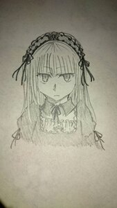 Rating: Safe Score: 0 Tags: 1girl bangs closed_mouth eyebrows_visible_through_hair frills greyscale hairband image long_hair long_sleeves looking_at_viewer monochrome photo ribbon solo suigintou traditional_media User: admin