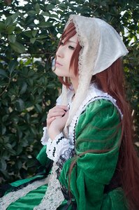 Rating: Safe Score: 0 Tags: 1girl bangs brown_hair closed_mouth dress from_side green_dress head_scarf lace lips long_hair long_sleeves outdoors plant profile solo suiseiseki User: admin