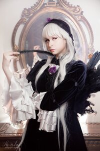 Rating: Safe Score: 0 Tags: 1girl black_wings dress flower frilled_sleeves frills gothic_lolita hairband lips lolita_fashion long_hair long_sleeves looking_at_viewer realistic red_eyes rose solo suigintou white_hair wings User: admin