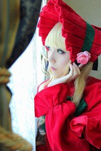 Rating: Safe Score: 0 Tags: 1girl bangs blonde_hair blue_eyes blurry blurry_foreground bonnet bow depth_of_field dress flower hat lips long_hair photo pink_flower pink_rose rose shinku solo User: admin