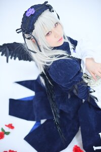 Rating: Safe Score: 0 Tags: 1girl blurry closed_mouth depth_of_field dress flower frills hairband lips long_hair long_sleeves looking_at_viewer red_flower ribbon rose solo suigintou wings User: admin