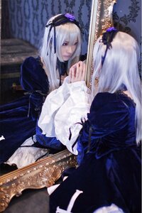 Rating: Safe Score: 0 Tags: 1girl dress flower frills hairband long_hair long_sleeves silver_hair sitting solo suigintou User: admin