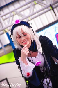 Rating: Safe Score: 0 Tags: 1girl black_dress blurry blurry_background blurry_foreground depth_of_field dress flower gothic_lolita hairband long_hair long_sleeves photo smile solo suigintou teeth User: admin